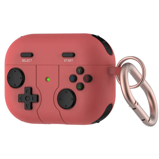 a pink game controller with a keychain attached to it