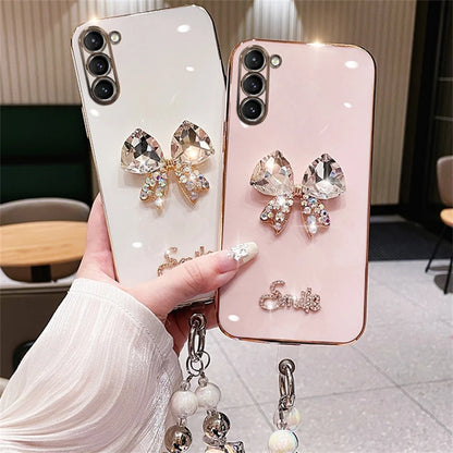 Luxury Plating Diamond Bow Wrist Chain Case For Samsung S23 S22 Ultra S21 S20 FE S10 Plus A54 A53 A52 A50 A73 A72 A34 A14 Cover